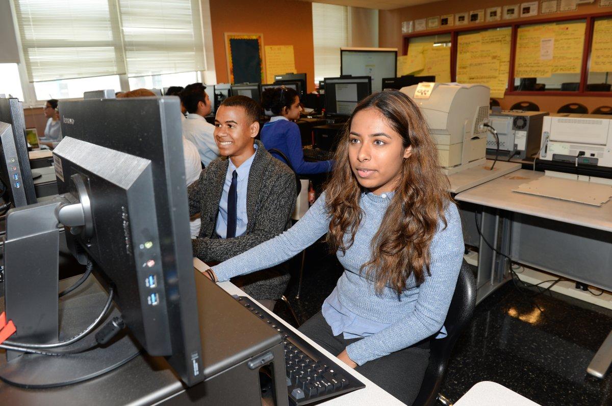 Students Brandon Prenz (l.) and Entasa Chowdhury (r.) in class at the Academy of Finance and Enterprise. (DEBBIE EGAN-CHIN/NEW YORK DAILY NEWS)